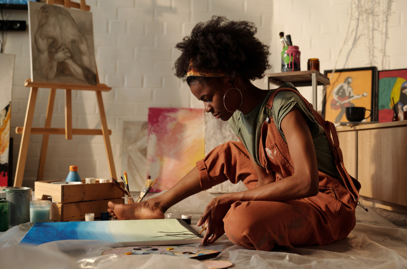 Person finding their flow through painting